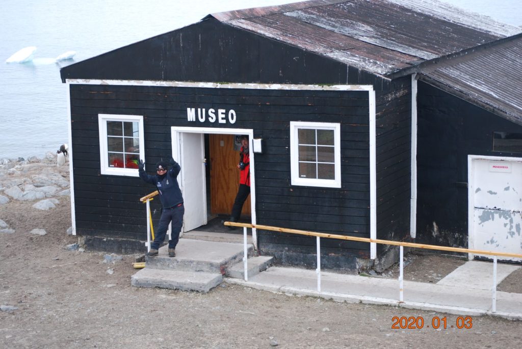 Guy posing for a pic Museum at Gonzales Videla base in Antarctica